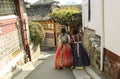 Korean girls dressed in traditional dress hanbok at Bukchon Hanok Village, Seoul, South Korea