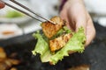 Korean grilled pork belly BBQ Samgyeopsal Gui - The popular Korean barbecue dish, served with fresh lettuce and a spicy dipping Royalty Free Stock Photo