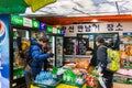 Korean hikers buying food at the shop on the way the Bukhansan Mountain National park