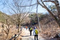 Korean hikers climbing the rock at the Bukhansan Mountain National park in Seoul, South Korea