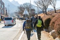 Korean hikers climbing the rock at the Bukhansan Mountain National park in Soeul, South Korea