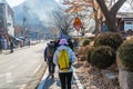 Korean hikers climbing the rock at the Bukhansan Mountain National park in Soeul, South Korea