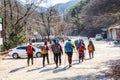 Korean hikers climbing the rock at the Bukhansan Mountain National park in Soeul, South Korea