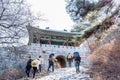 Korean hikers climbing the rock at the Bukhansan Mountain National park in Soeul, South Korea