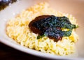 Korean instant noodle with sauce with seaweed Royalty Free Stock Photo