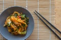 Fresh Korean kimchee in a bowl next to chopsticks Royalty Free Stock Photo