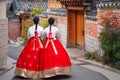 Korean lady in Hanbok or Korea dress and walk in an ancient town in seoul Royalty Free Stock Photo