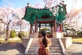 Korean lady travel and take camera for Pavilion in Seoul National Cemetery