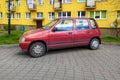 Korean red compact Daewoo Tico private city car parked Royalty Free Stock Photo