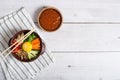 Korean rice dish Bibimbap. Usually served as a bowl of warm white rice topped with vegetables and egg. Top view Royalty Free Stock Photo