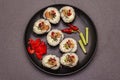 Korean roll Gimbapkimbob. Steamed white rice bap and various other ingredients. Trendy black background Royalty Free Stock Photo