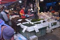 Korean selling seaweed at wet market