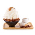 Korean shaved ice dessert with sweet toppings, red tea Bingsoo o