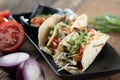 Korean short rib tacos with spring onion tomato salsa