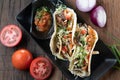 Korean short rib tacos with spring onion tomato salsa