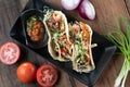 Korean short rib tacos with spring onion tomato salsa