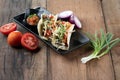 Korean short rib tacos with spring onion tomato salsa