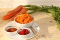 Korean side dish for barbecue dinner, carrots with sauce and hot pepper, A set of fermented foods that are good for intestinal Royalty Free Stock Photo