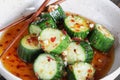 Korean Spicy Cucumber Salad Oi Muchim with garlic and hot peppers