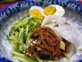 Korean spicy noodles mix bibim naengmyeon