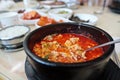 Korean spicy tofu soup sundubu jjigae in a hot pot