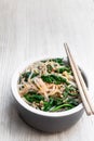 Korean spinach mung bean sprouts salad on white wooden table