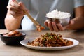 Korean stir fried kimchi cabbage with pork eating with kimchi and cooked rice Royalty Free Stock Photo