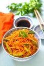 Korean-style carrot salad with cucumbers and soy sauce