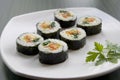 Korean sushi and a parsley leaf.