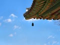 Korean temple roof with bell Royalty Free Stock Photo