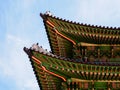 Korean traditional wooden roof. Gyeongbokgung Palace. Seoul, South Korea Royalty Free Stock Photo
