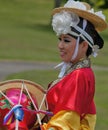 Korean Woman in Headdress with Drum at Cultural Celebration