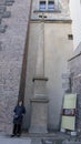 Korean woman standing by the Memorial obelisk Vilem Slavata of Chum, South Gardens of the Prague Castle, Czech Republic