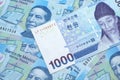 A Korean won bank note with Mexican twenty peso bank notes