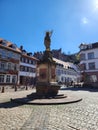The Kornmarkt in the Altstadt of Heidelberg has a Madonna statue on a golden globe.