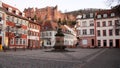 Kornmarkt, small square with baroque fountain, Heidelberg Castle in the background above, Heidelberg, Germany Royalty Free Stock Photo