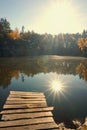 Korostyshevsky quarry, Ukraine. Bright sun over the forest is reflected in the lake Royalty Free Stock Photo