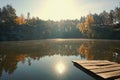 Korostyshevsky quarry, Ukraine. Bright sun over the forest is reflected in the lake Royalty Free Stock Photo