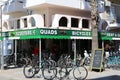 Tourists renting Bicycles from a Local Shop