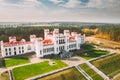 Kosava, Belarus. Aerial Bird`s-eye View Of Famous Popular Historic Landmark Kosava Castle. Puslowski Palace Castle