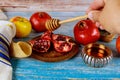 Kosher fruit, pomegranates, apples a honey jar that symbolizes the holiday Jewish New Year on Rosh Hashanah and shofar