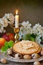 Kosher wine cup, matzah flatbread at passover embracing a jewish pesach attributes Royalty Free Stock Photo