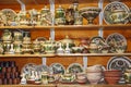 Earthenware on the shelves of shop. Ceramic goods. Products of ceramics on sale