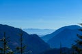 Kosmatitza - Panoramic view of misty Karawanks mountain range on sunny day in Carinthia, Austria