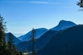 Kosmatitza - Panoramic view of misty Karawanks mountain range on sunny day in Carinthia, Austria