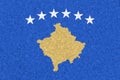 Kosovo flag on styrofoam texture