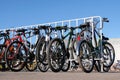 Kostanay, Kazakhstan, 2019-10-06. A place for parking bicycles of different brands during the mass arrival of cyclists. The