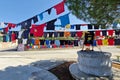 Kostanjevica na Krasu, Slovenia - August 16th 2022: Many T-shirts and flags in honor to all firefighters who helped fighting the