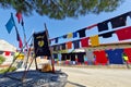 Kostanjevica na Krasu, Slovenia - August 16th 2022: Many T-shirts and flags in honor to all firefighters who helped fighting the