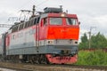 Passenger electric locomotive ChS-4t in motion close-up